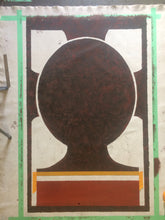 A square textile or fabric panel featuring a stylized dark brown floral oval silhouette with white and green border accents, laid flat on a light surface.